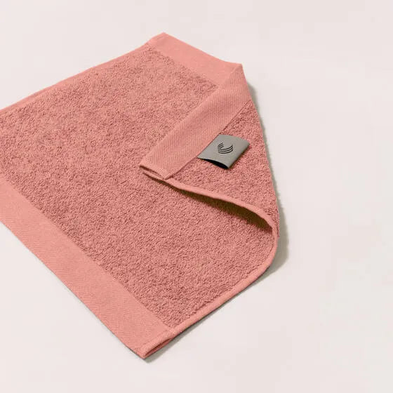 Duurzame roze Luna gezichtsdoek (4 stuks) van 67% gerecycled katoen en 33% polyester, 500 g/m², hoge kwaliteit, zacht, absorberend en sneldrogend.