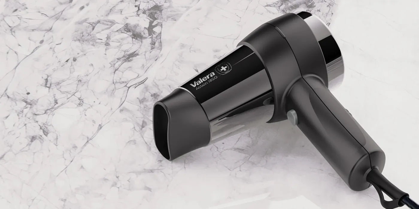 Haardroger Action 1200W Push liggend op een marmeren blad