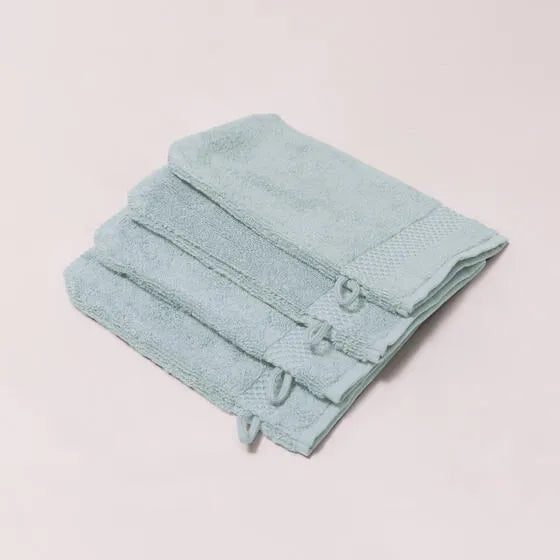 Luxe hemelsblauw Florence washandjes (4 stuks) van 100% GOTS-katoen, 600 g/m², hoge kwaliteit, zacht en absorberend.